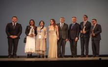 Foto de grupo de los premiados por la OMT.